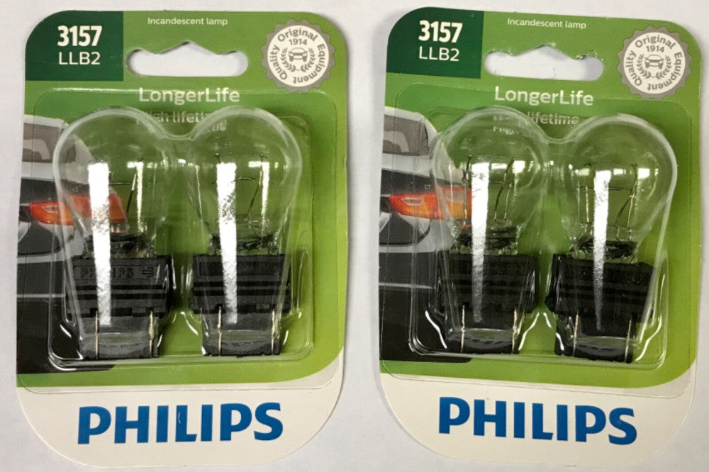 LOT OF (4) PHILIPS 3157 LLB2 12.8v Automobile Lamp Bulb 3157LL 9D