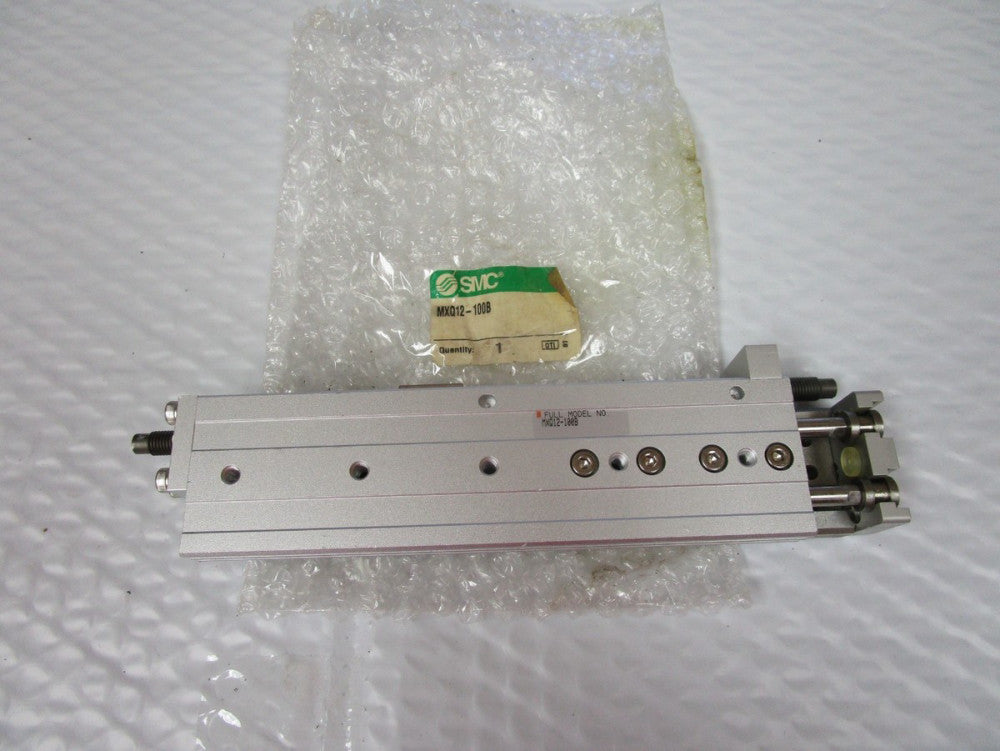 NEW SMC CYLINDER SLIDE TABLE MXQ12-100B 0.15-0.7/MPA